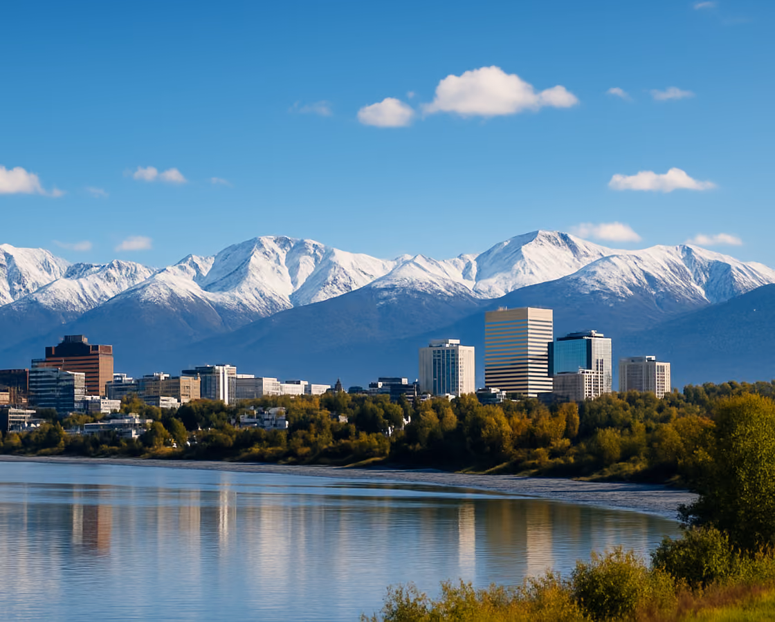 Anchorage, Alaska skyline with the snow-capped Chugach Mountains rising behind it