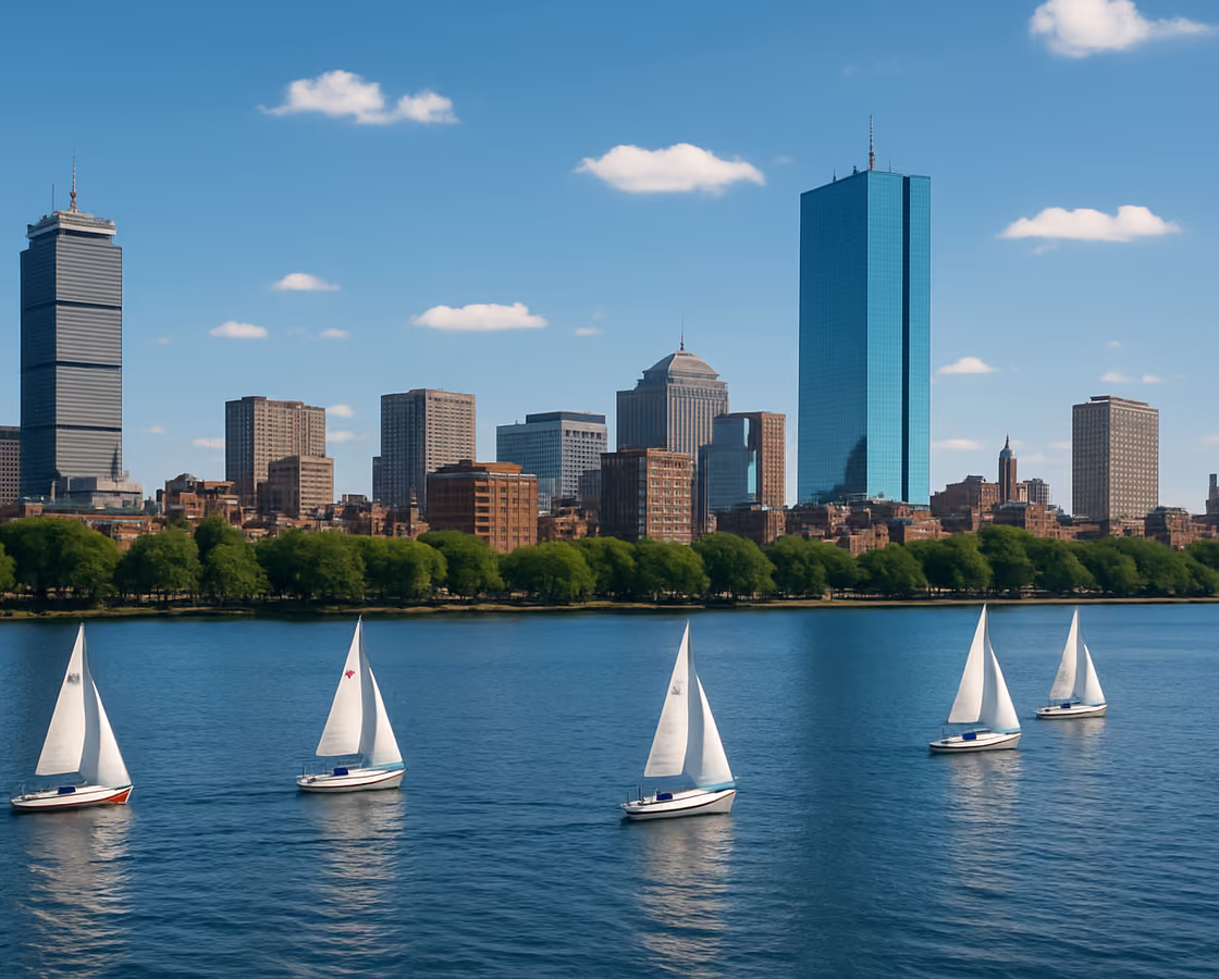 Boston, Massachusetts skyline across the Charles River from Cambridge with sailboats