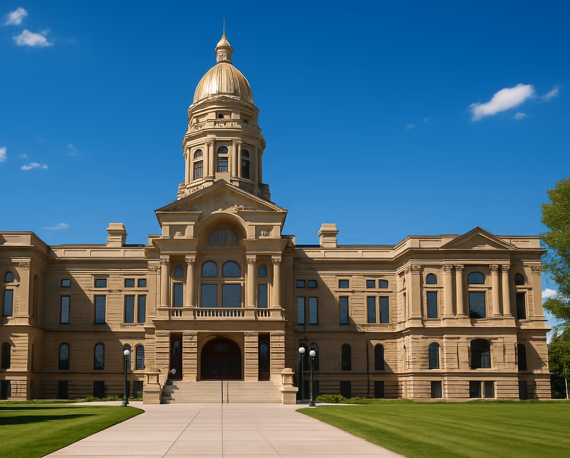 Wyoming State Capitol in Cheyenne, Wyoming beneath a wide blue sky